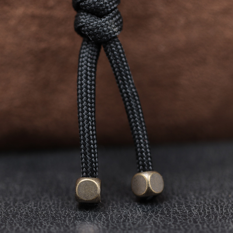 2pcs 4mm Hole Cube Brass Knife - Paracord Survival Bracelet recension och pris