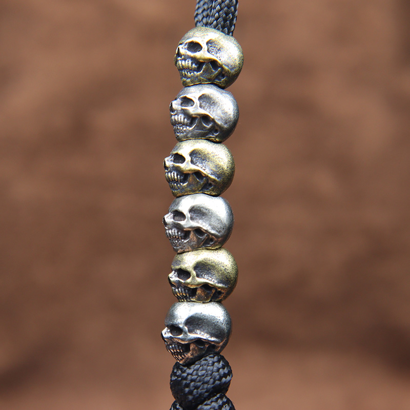 Mini Skull Head Brass Knife Be - Paracord Survival Bracelet recension och pris