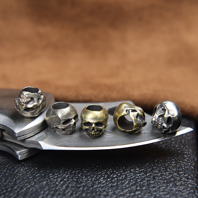 Mini Skull Head Brass Knife Be - Paracord Survival Bracelet recension och pris