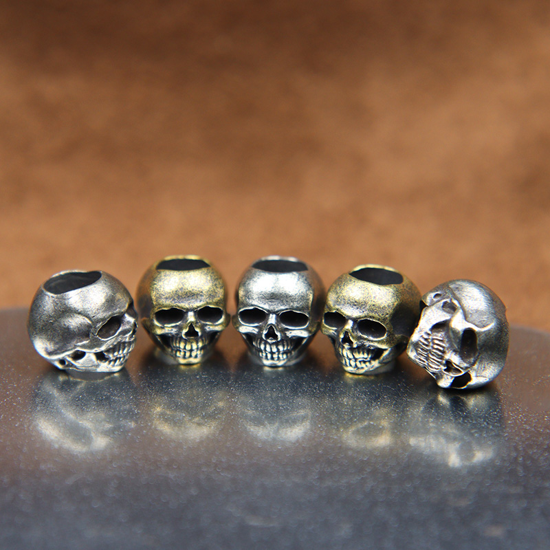 Mini Skull Head Brass Knife Be - Paracord Survival Bracelet recension och pris